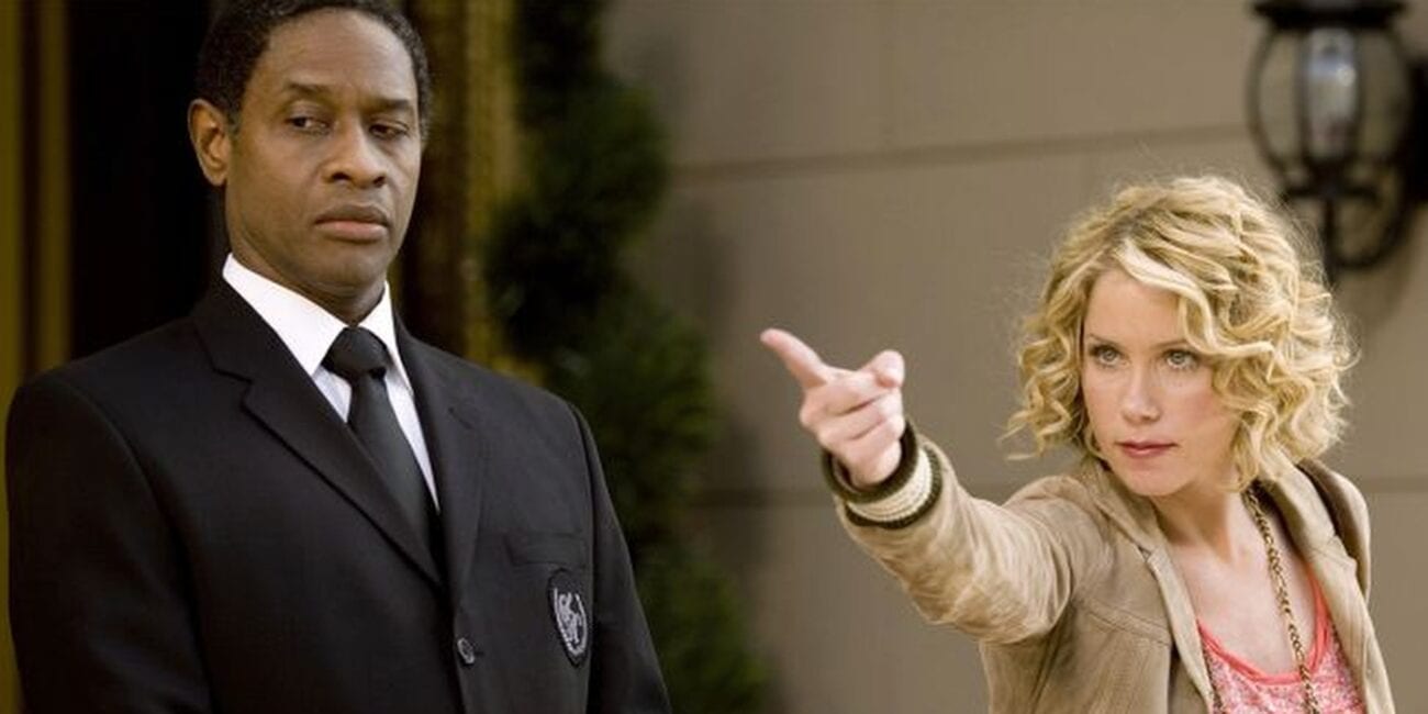 Samantha pointing, with her doorman standing next to her in Samantha Who a 2000s TV show