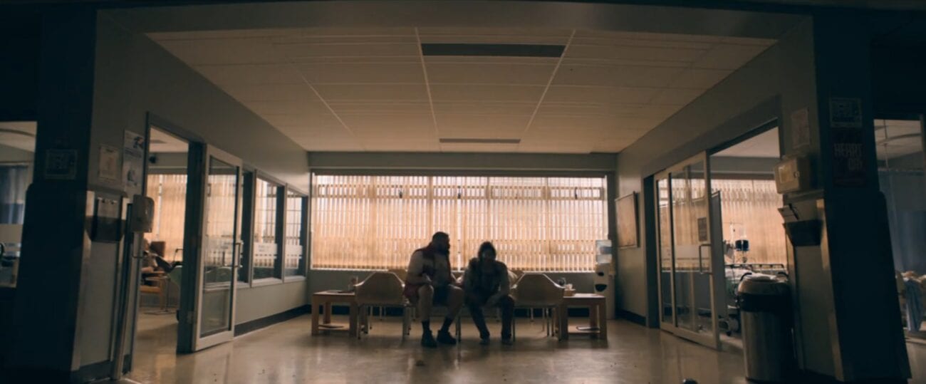 The Stand S1E3 - Tom and Nick sit in a set of hospital waiting room chairs at dusk