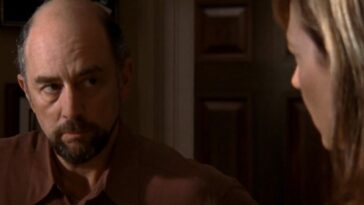 Close up of Toby Ziegler (Richard Schiff) looking at C.J. Cregg (Allison Janney)