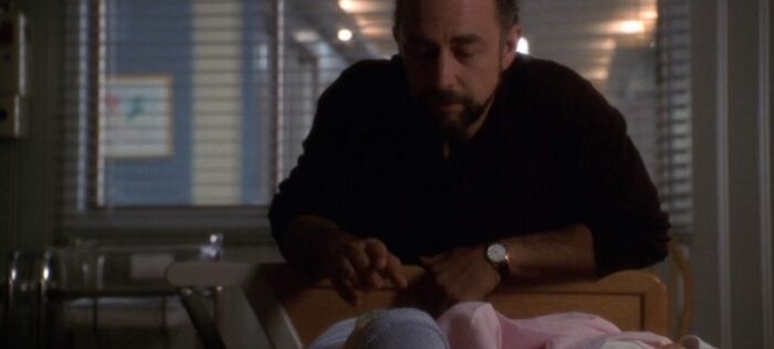 Toby Ziegler (Richard Schiff) in the hospital nursery looking at his babies, Huck and Molly