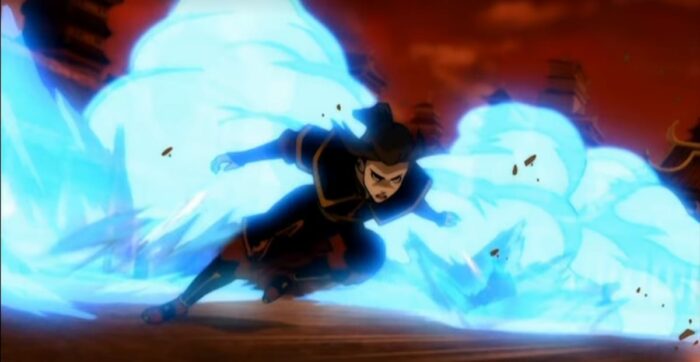 Azula charges forward propelled by her blue flames, the sky is red and cloudy in the background
