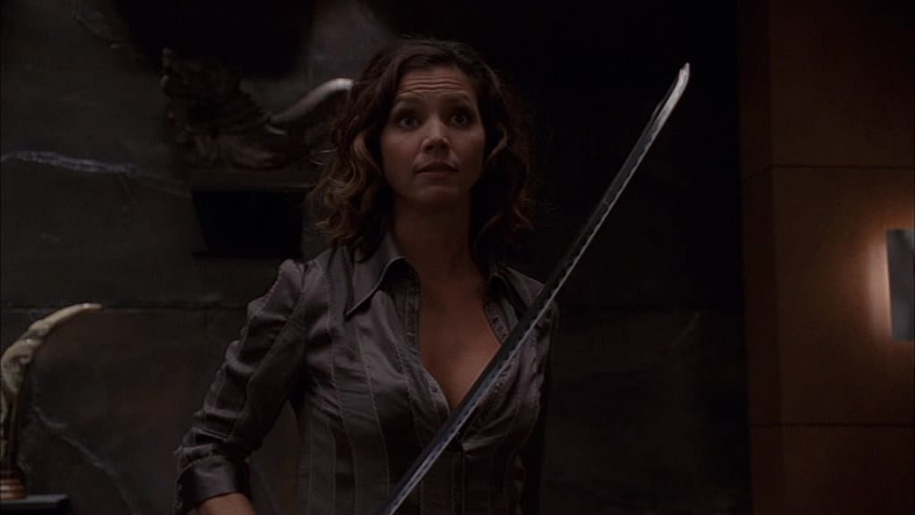 Cordelia brandishes a sword in Wolfram and Hart HQ.