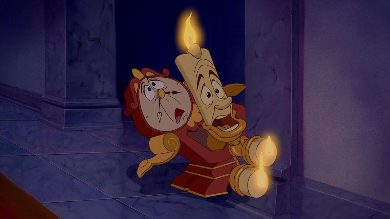Lumiere and Cogsworth look around a corner and are shocked at what they see