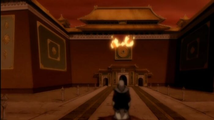 Iroh stands in front of the palace in Ba Sing Se as the flag of the Fire Nation burns away revealing the Earth Kingdom flag beneath