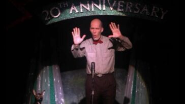 The giant on the miss twin peaks stage waving his arms to warn cooper