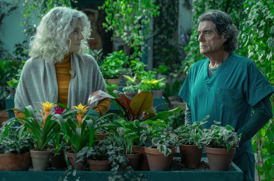 Demeter and Wednesday have a serious conversation in the greenhouse of the home