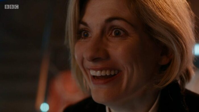 The newly regenerated Thirteenth Doctor with a massive smile on her face