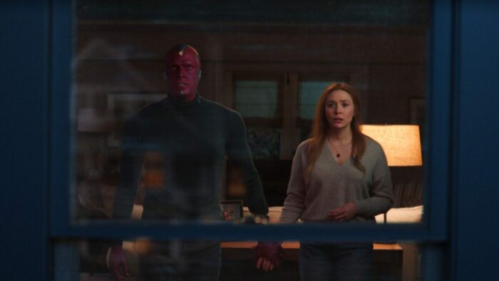 The Vision (Paul Bettany) and Wanda (Elizabeth Olsen) look out the window in WandaVision's series finale