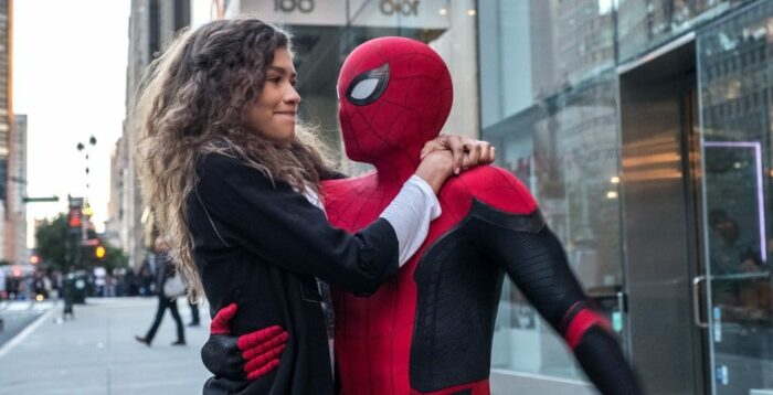 Spider-Man holds MJ in his arms