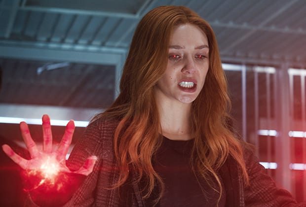 Wanda looks down in anger and prepares her powers from her right hand
