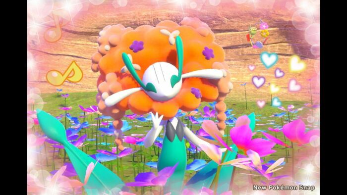 A photo of a Florgess Pokémon decorated with heart stickers