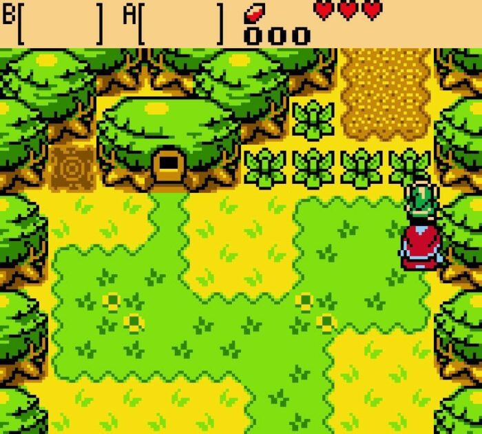 Link stands in front of a bush with Impa in Oracle of Ages