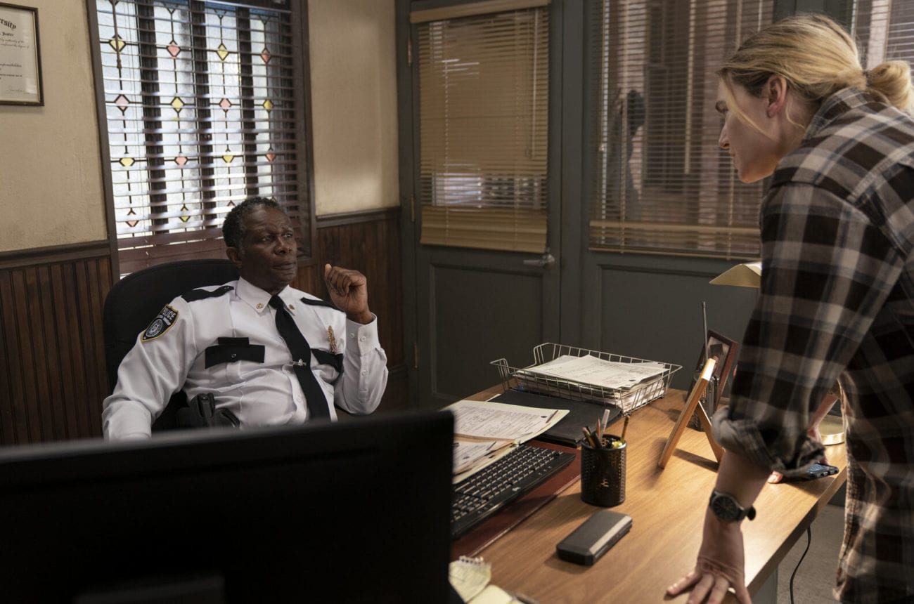 Detective Mare Sheehan (Kate Winslet) in a heated discussion with Chief Carter (John Douglas Thompson) in a scene from Mare of Easttown.
