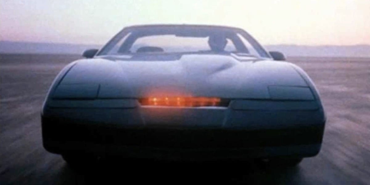 KITT driving in the desert, with Michael at the wheel of the car in the original Knight Rider