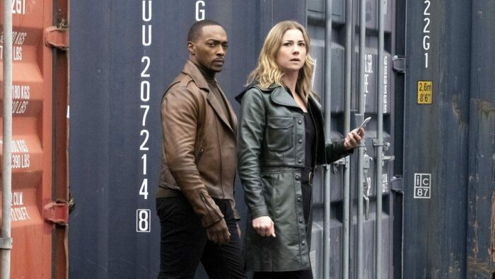 Sam and Sharon Carter (Emily VanCamp) search shipping crates...