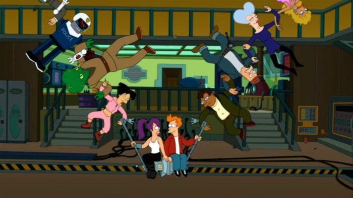 Fry and Leela interlock their friends and use them as a swing in the ship's hangar space of Planet Express