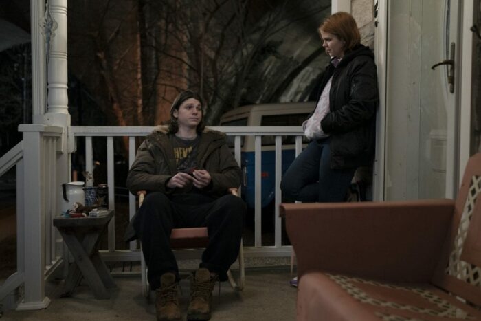 Brianna (Mackenzie Lansing) speaks with Dylan (Jack Mulhern) outside.