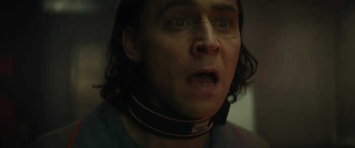 Loki gasps as he watches himself die in the future.