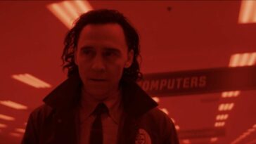 Loki decides to run away with his fellow variant, bathed in red light.