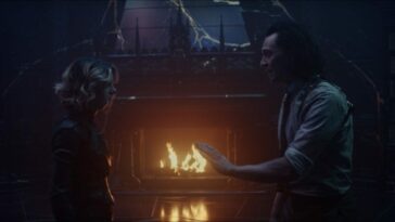 Loki (right) extends his hand to Sylvie (left) as they stand in front of a fireplace, about to fight.