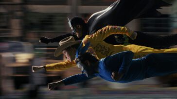 Josh, Dax and Victor fly through the air, punching, in a cartoonish style in Mr. Corman Action Adventure
