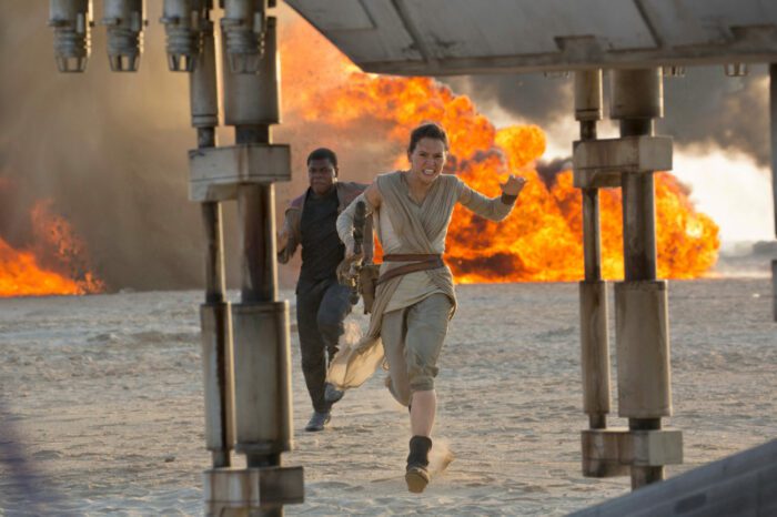 Rey (Daisy Ridley) and Finn (John Boyega) board the Millennium Falcon