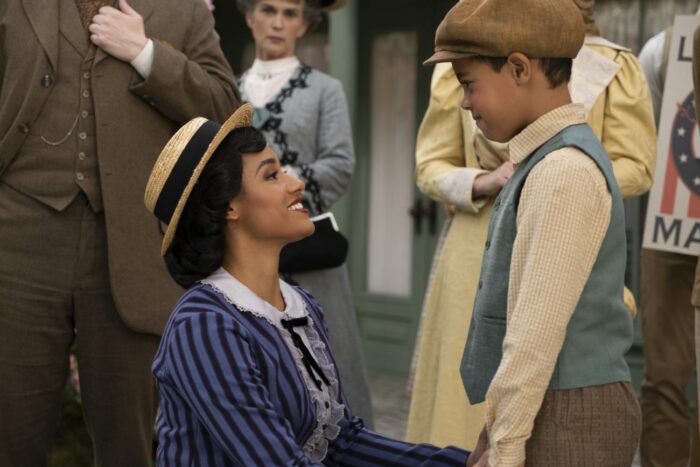 Edna (Ariana DeBose) looking lovingly at Carson (Liam Quiring-Nkindi)