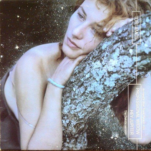 Tori Amos rests on a tree branch and is surrounded by hundreds of stars on the cover of the "Hey Jupiter EP."