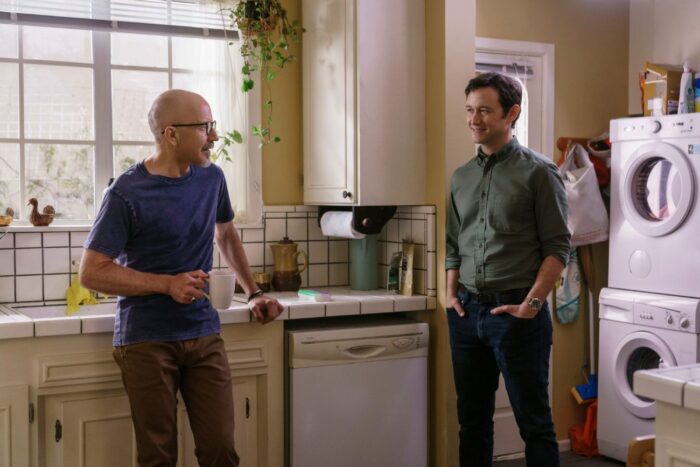 Josh and Larry talk in Ruth's kitchen