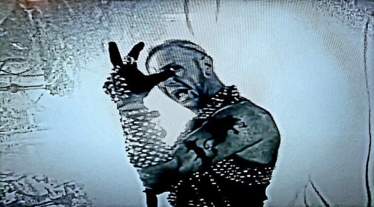 Lead vocalist of Judas Priest Rob Halford singing in leather and studs