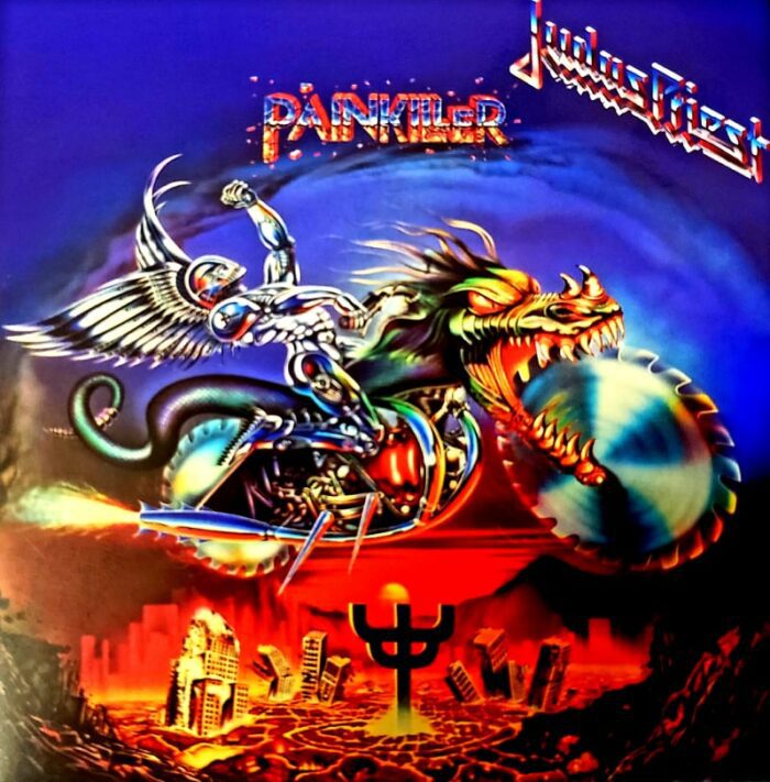 Cover art to Judas Priest's Painkiller featuring a chrome coated warrior on motorcycle with buzzsaw tires screaming across the sky, perhaps to face the Night Crawler