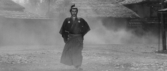 Toshiro Mifune as Sanjuro steps out of the fog in Kurosawa's 'Yojimbo.' The iconic shot is the inspiration for the still from 'The Duel' pictured above.