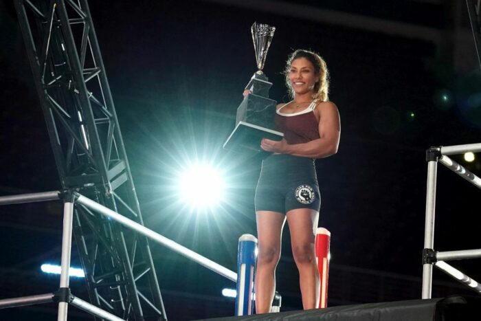 Meagan Martin holds her trophy after competing in American Ninja Warrior