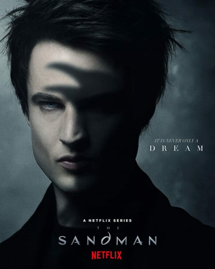 A man with shadows on his face in a promo for The Sandman