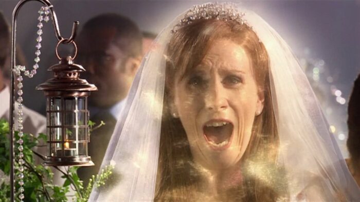 Donna screaming as she starts glowing with huon particles while walking down the aisle in 'The Runaway Bride'