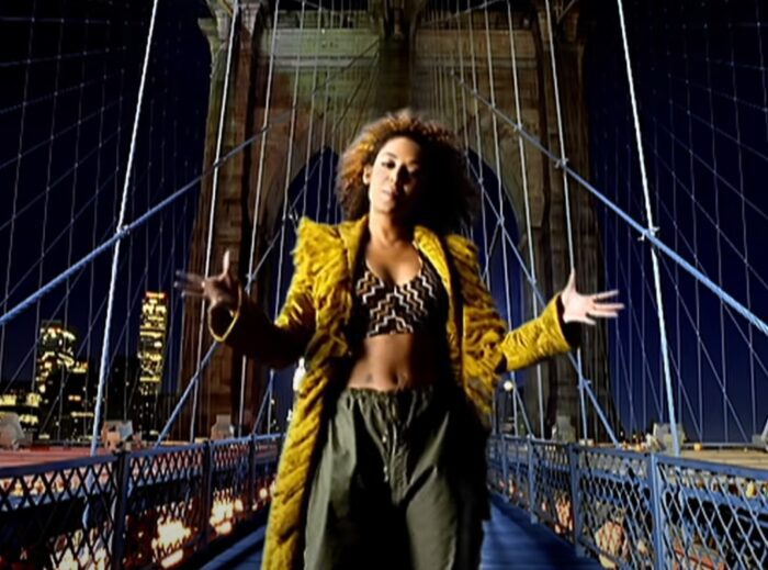 Mel B. singing in the video for the Spice Girls song 2 Become 1