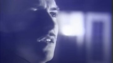 The lead singer of Ultravox with a slim mustache singing in the video for "Vienna" by Ultravox
