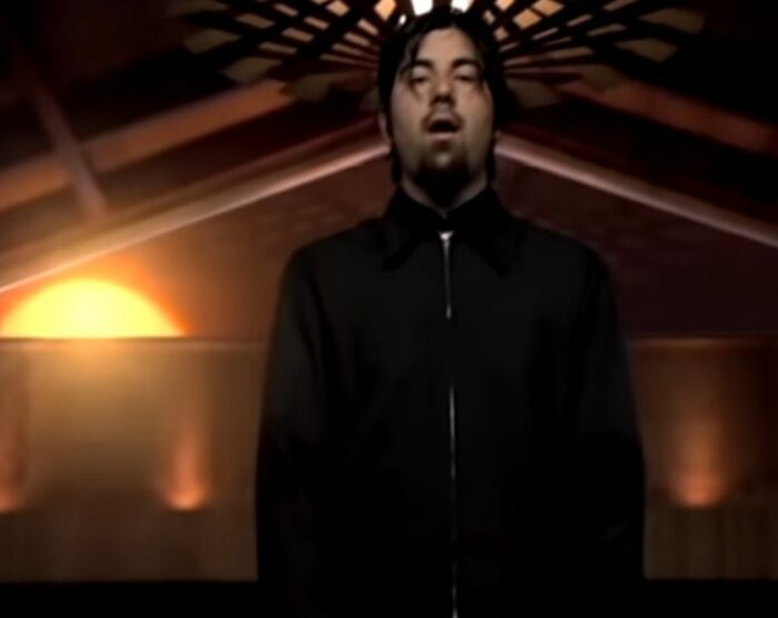 Deftones vocalist Chino Moreno standing alone all in black
