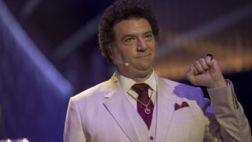 Jesse Gemstone raising a fist in the air in The Righteous Gemstones