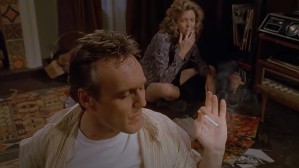 Giles smoking and listening to music with Joyce in 'Band Candy'