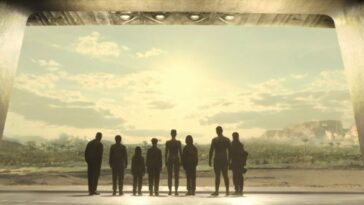 Raised by Wolves S2E1 - Mother, Father, Sure and five of the children are silhouetted against the bright landscape standing at a large hangar door