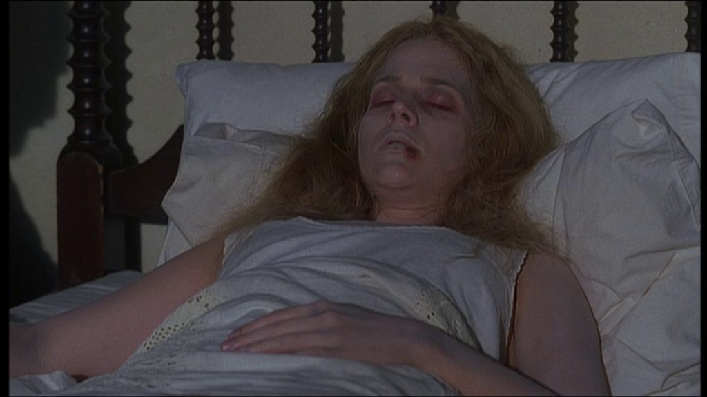 Darla (Julie Benz) laying on her death bed.