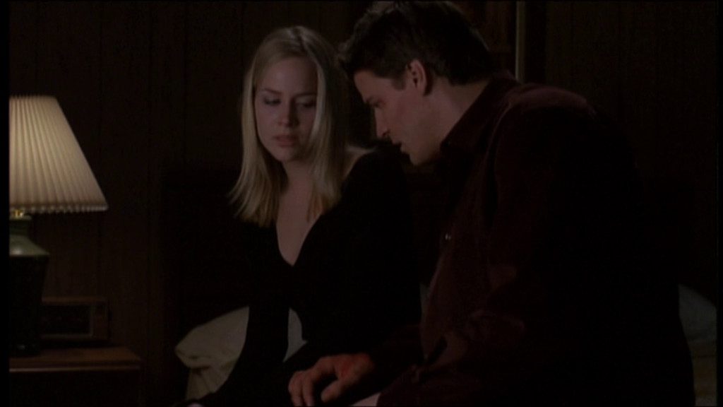Darla (Julie Benz) and Angel (David Boreanaz) come to terms with her fate while in her hotel room.