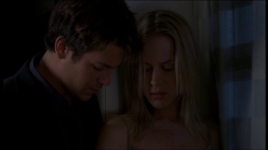 Lindsey (Christian Kane) comforts Darla (Julie Benz)