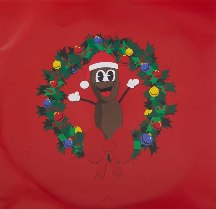 Mr Hankey the Christmas Poo, in the centre of a holiday wreath