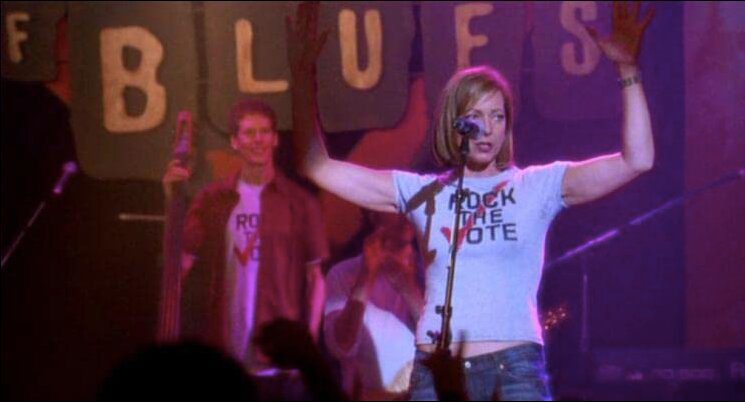 CJ Cregg addresses the crowd from the stage at a Rock The Vote show at The House of Blues