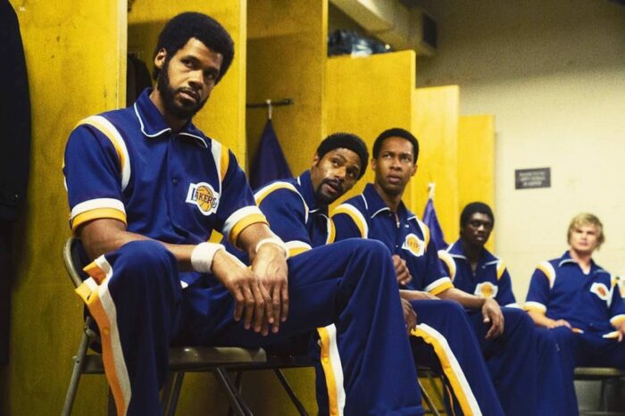 The Lakers sit in the locker room before their next game. 