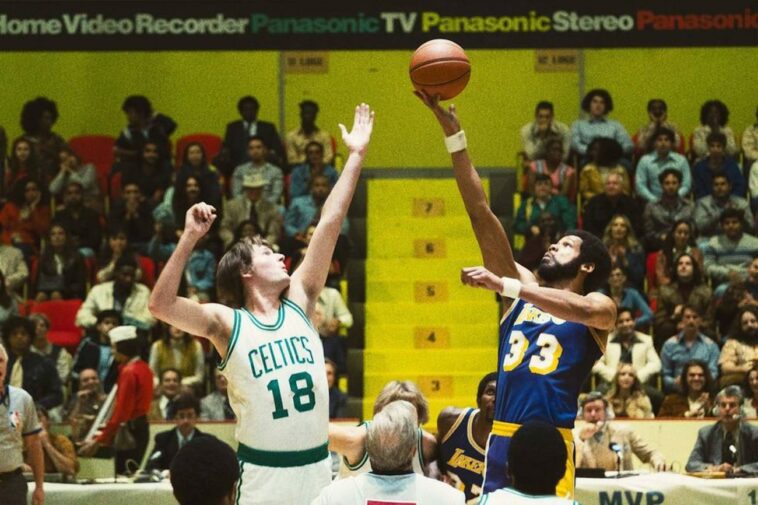 Kareem and Larry Bird leap for the ball in Winning Time S1E7