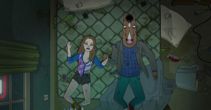 Sarah Lynn (left) and BoJack (right) lie down on a dirty motel bed, holding hands.