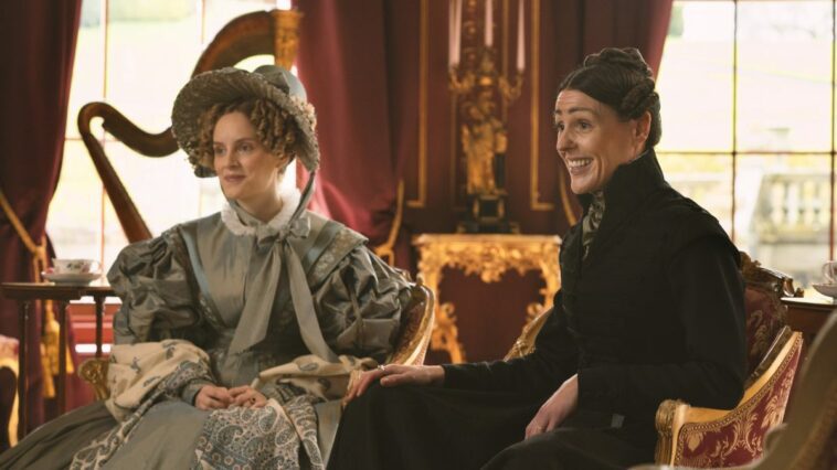 Walker and Lister (Sophie Rundle and Suranne Jones) happily sit talking to someone.